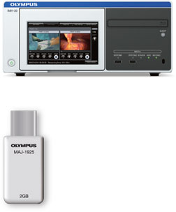 Front panel of image management hub with image displayed and accompanying two-gigabyte memory drive